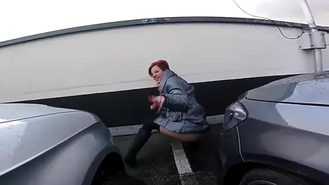 Redhead Exhibitionist Shows Pussy in Public While Peeing