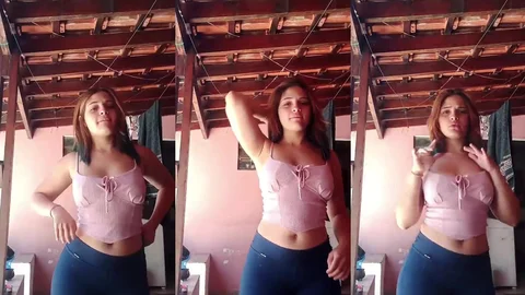 Morena rebolando no top rosa