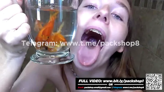 Beautiful and wicked woman devours live fish - Giantess Vore Fetish