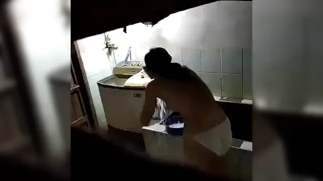 Horny Brunette Spied On In The Shower