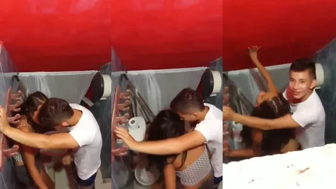 Casal se pegando no pelo e sendo vazado