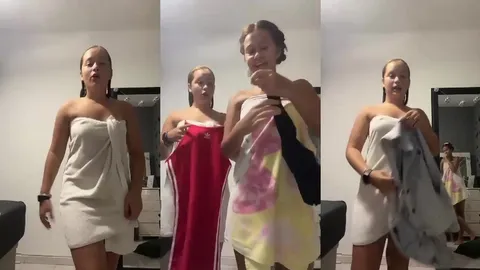 Loirinha trocando de roupa na frente da câmera