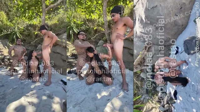 Morena tatuada de cabelo liso e piercing na teta chupa e senta na praia